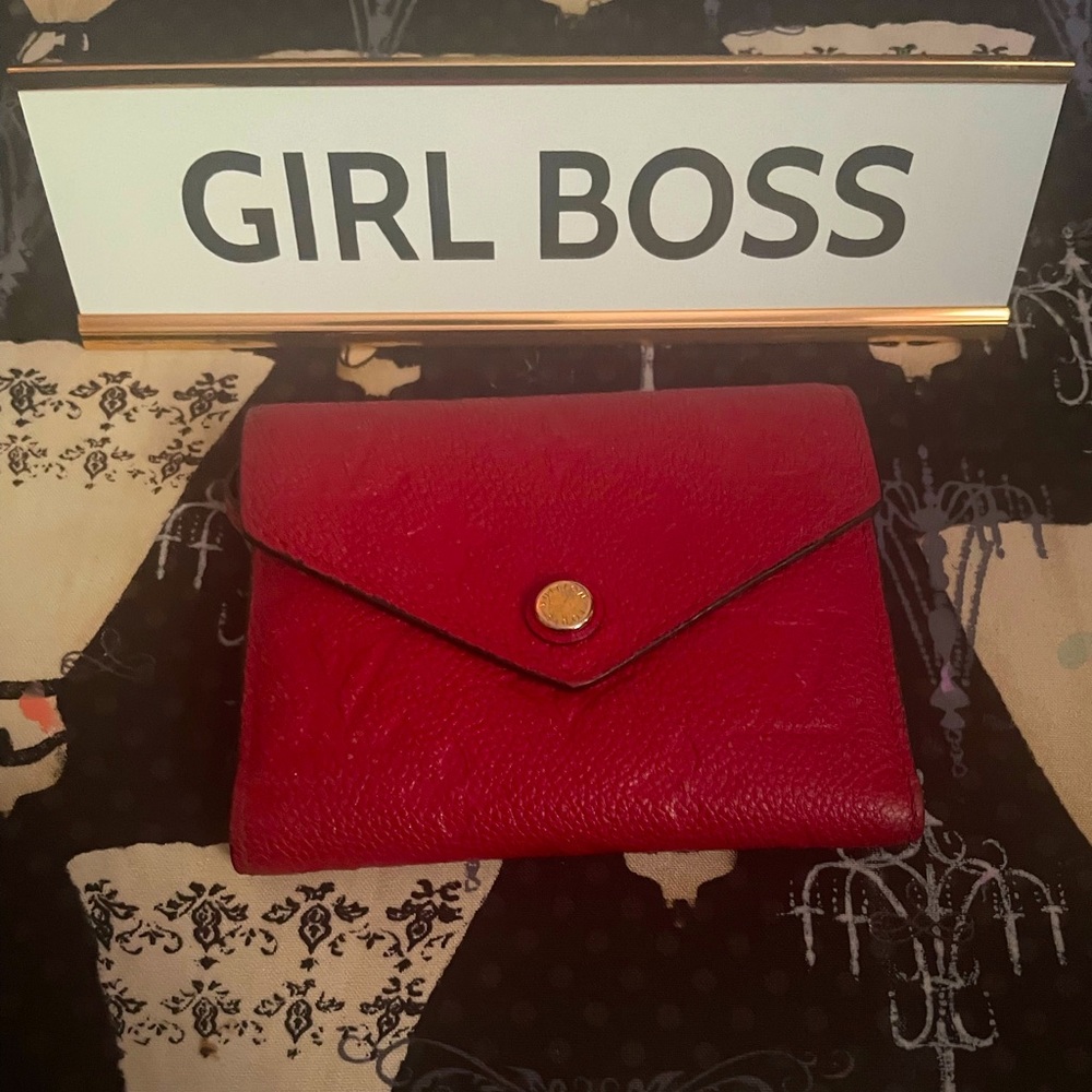 Red leather Louis Vuitton Victorian wallet